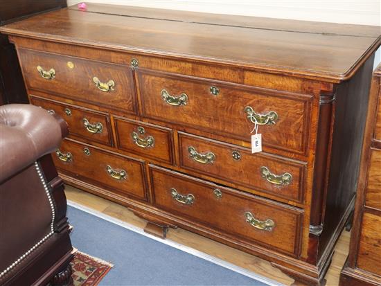 A mid 18th century banded oak mule chest, with rising top, two dummy and five long drawers W.158cm